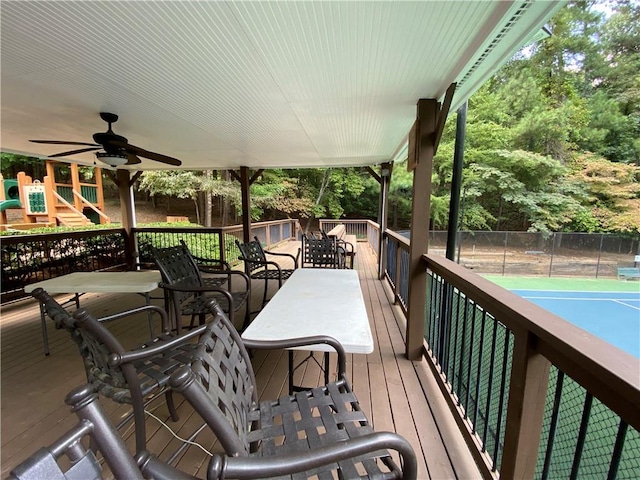 wooden deck with ceiling fan