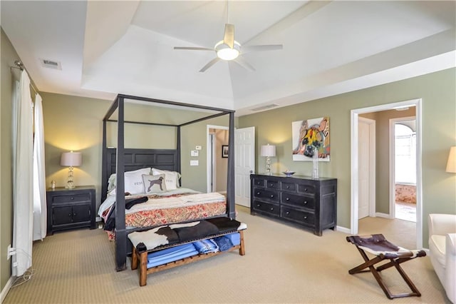 carpeted bedroom with visible vents, ceiling fan, and baseboards