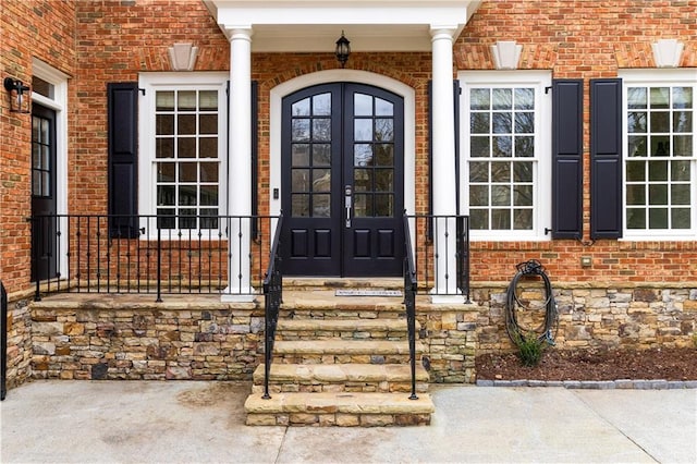 view of exterior entry with french doors