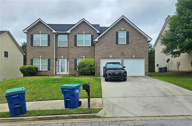 view of front facade with brick siding, concrete driveway, an attached garage, a front lawn, and central air condition unit