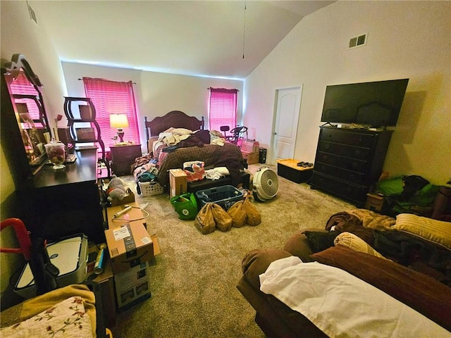 bedroom featuring carpet flooring and lofted ceiling