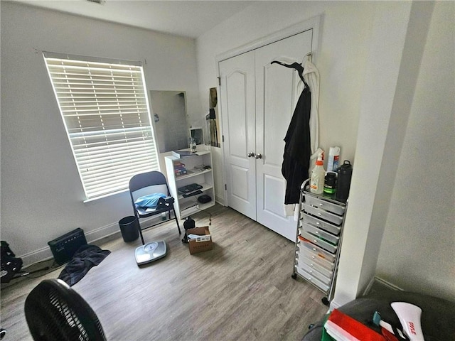 miscellaneous room with wood finished floors