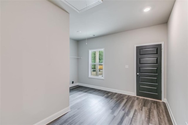 foyer with dark hardwood / wood-style floors