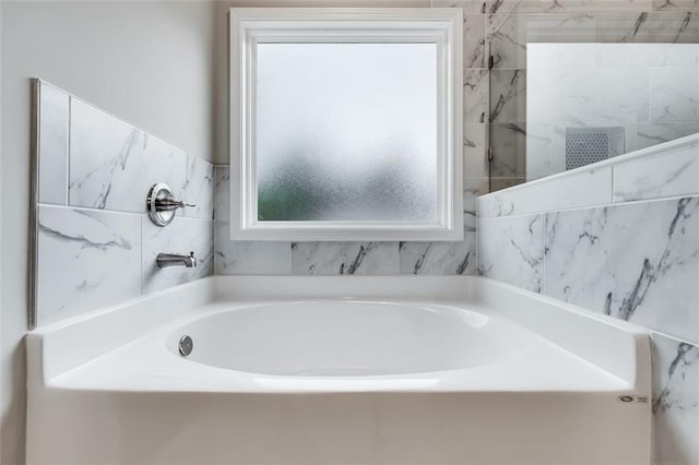 bathroom with a bathing tub