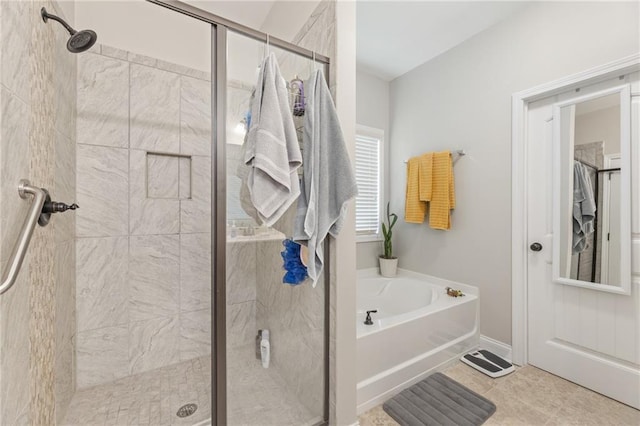 bathroom featuring tile patterned flooring and plus walk in shower