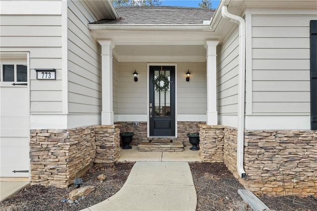 property entrance with covered porch