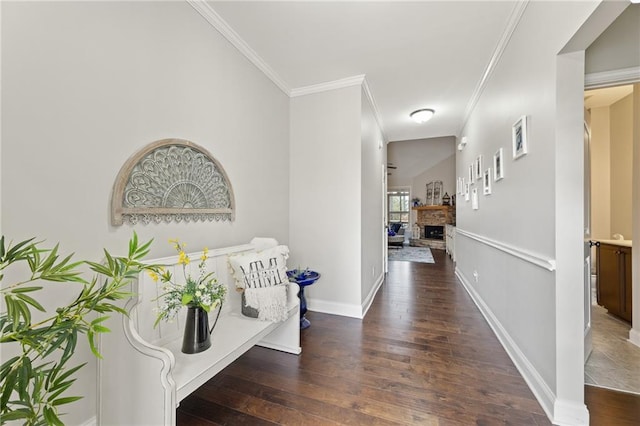 hall with crown molding and dark hardwood / wood-style floors