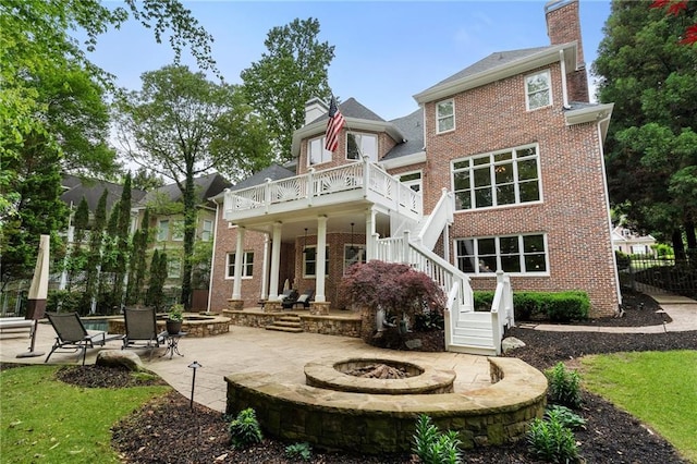 640 Greenview Ter, Milton, GA 30004 - rear view of property with a fire pit, a chimney, a patio area, and brick siding