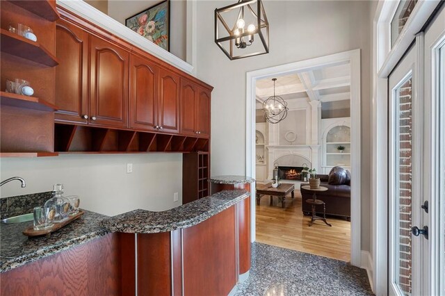 640 Greenview Ter, Milton, GA 30004 - bar featuring a chandelier, pendant lighting, beamed ceiling, a high end fireplace, and coffered ceiling