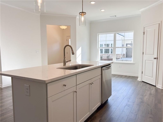 kitchen with light stone countertops, a kitchen island with sink, sink, dishwasher, and dark hardwood / wood-style floors