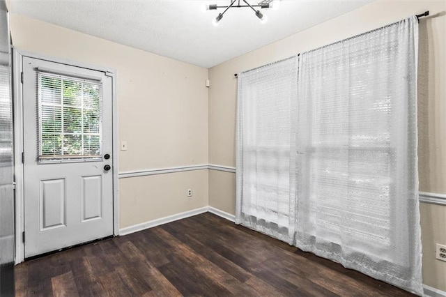 4146 Monclair Dr, Columbus, GA 31907 - unfurnished dining area with wood finished floors and a chandelier