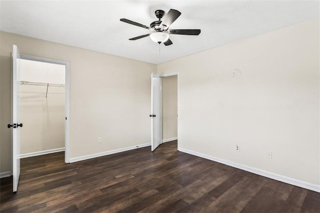4146 Monclair Dr, Columbus, GA 31907 - unfurnished bedroom featuring wood finished floors, a closet, a ceiling fan, and a spacious closet