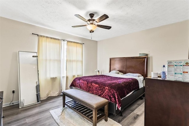 4146 Monclair Dr, Columbus, GA 31907 - bedroom featuring wood finished floors, a textured ceiling, and a ceiling fan