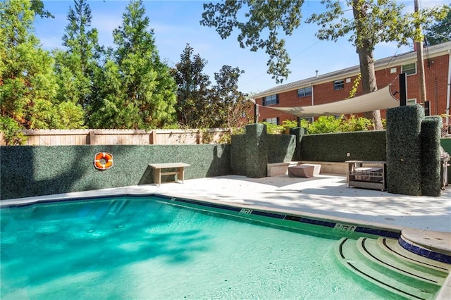 view of pool featuring a patio area