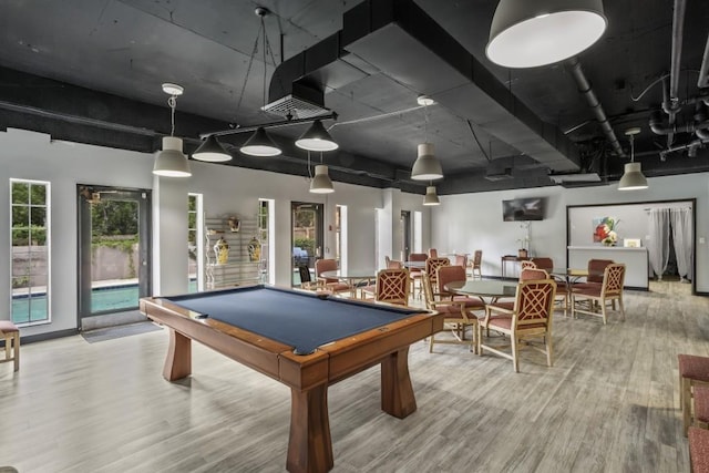 playroom with hardwood / wood-style flooring and pool table