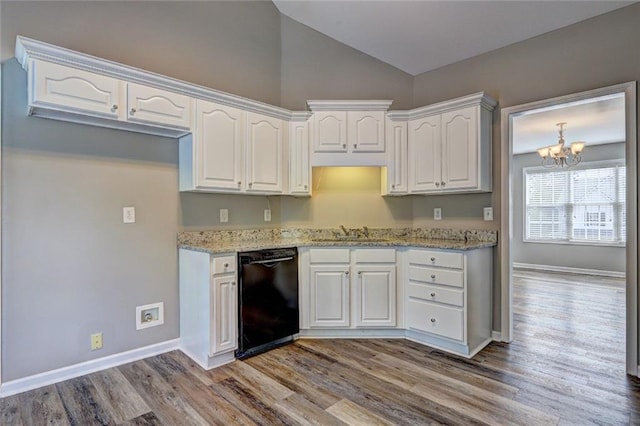 154 Jerry Allen Rdg, Dallas, GA 30132 - kitchen featuring black dishwasher, vaulted ceiling, white cabinets, light stone counters, and wood finished floors
