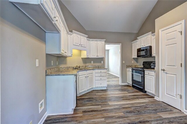 154 Jerry Allen Rdg, Dallas, GA 30132 - kitchen with black appliances, white cabinets, dark wood-style floors, baseboards, and a sink