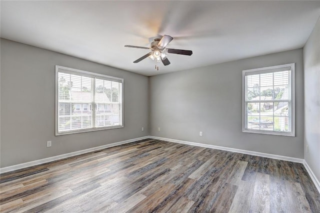 154 Jerry Allen Rdg, Dallas, GA 30132 - empty room featuring plenty of natural light, wood finished floors, and a ceiling fan