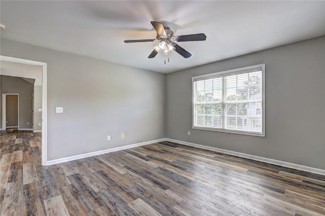 154 Jerry Allen Rdg, Dallas, GA 30132 - empty room featuring ceiling fan, wood finished floors, and baseboards