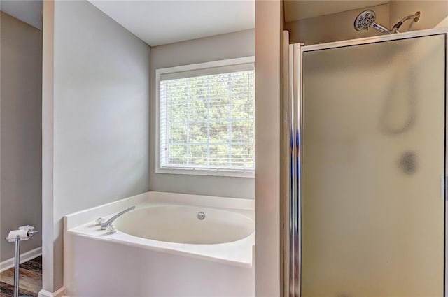 154 Jerry Allen Rdg, Dallas, GA 30132 - full bath with a shower stall, a garden tub, and baseboards