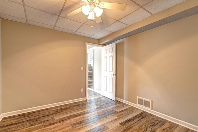 154 Jerry Allen Rdg, Dallas, GA 30132 - unfurnished room with a paneled ceiling, wood finished floors, baseboards, and a ceiling fan