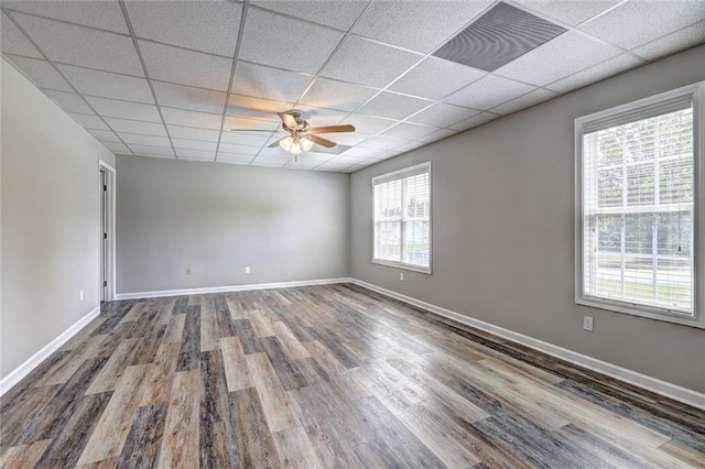 154 Jerry Allen Rdg, Dallas, GA 30132 - empty room with a paneled ceiling, a ceiling fan, wood finished floors, and baseboards
