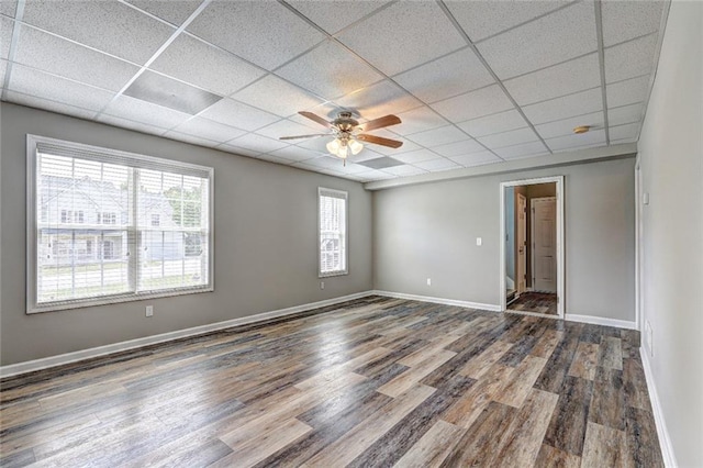 154 Jerry Allen Rdg, Dallas, GA 30132 - spare room with a drop ceiling, wood finished floors, a ceiling fan, and baseboards