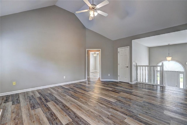154 Jerry Allen Rdg, Dallas, GA 30132 - empty room with a ceiling fan, high vaulted ceiling, wood finished floors, and baseboards