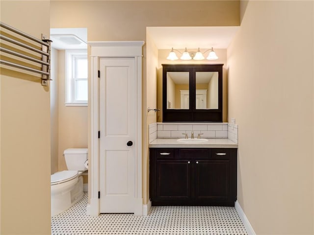 689 Berne St SE, Atlanta, GA 30312 - bathroom with vanity, backsplash, and tile patterned floors