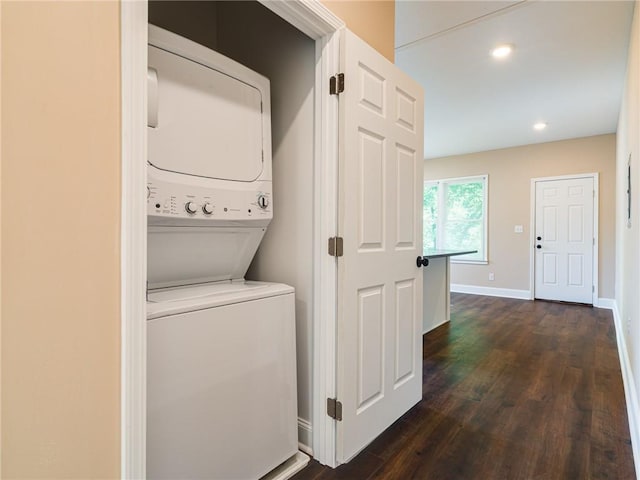 689 Berne St SE, Atlanta, GA 30312 - laundry area featuring stacked washing machine and dryer, dark wood finished floors, and recessed lighting