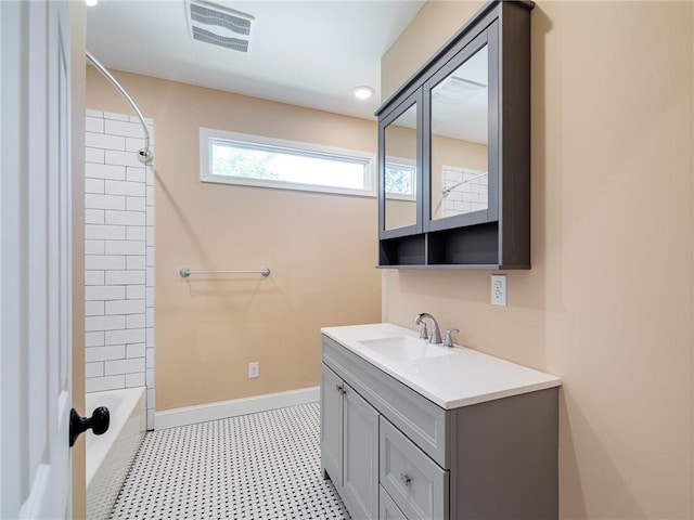 689 Berne St SE, Atlanta, GA 30312 - bathroom with vanity, tile patterned floors, and shower / washtub combination