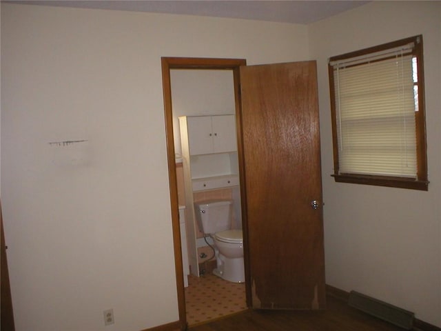 unfurnished bedroom featuring ensuite bathroom