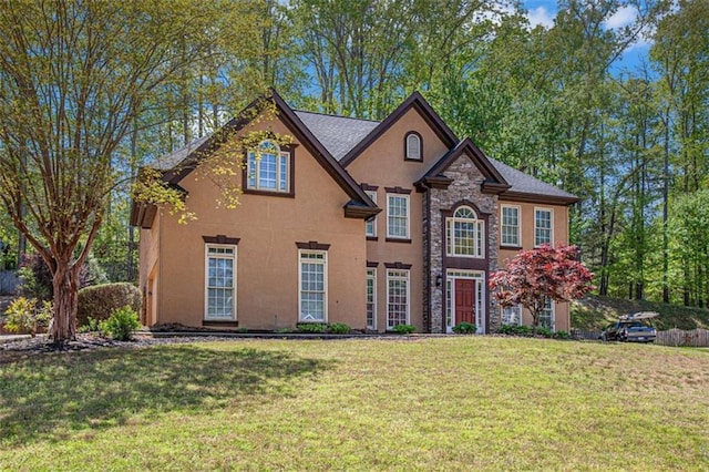 4609 Mctyre Way, Marietta, GA 30064 - view of front of home featuring a front yard, stucco siding, and stone siding
