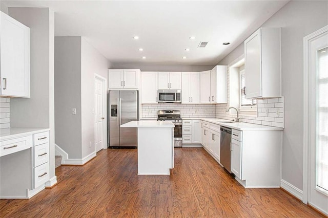 4609 Mctyre Way, Marietta, GA 30064 - kitchen featuring appliances with stainless steel finishes, baseboards, visible vents, and a wealth of natural light