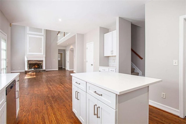 4609 Mctyre Way, Marietta, GA 30064 - kitchen featuring white cabinets, light countertops, dishwasher, and dark wood finished floors