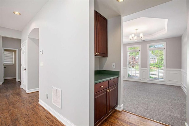 4609 Mctyre Way, Marietta, GA 30064 - interior space featuring visible vents, recessed lighting, a chandelier, dark wood-style flooring, and wainscoting