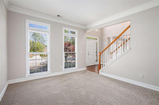 4609 Mctyre Way, Marietta, GA 30064 - carpeted entrance foyer with ornamental molding, baseboards, visible vents, and stairs