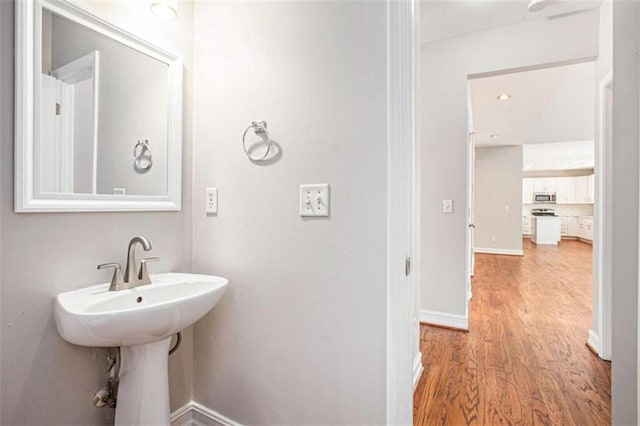 4609 Mctyre Way, Marietta, GA 30064 - bathroom featuring a sink, baseboards, and wood finished floors