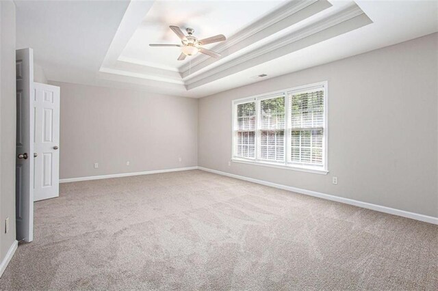 4609 Mctyre Way, Marietta, GA 30064 - carpeted empty room featuring baseboards, a tray ceiling, crown molding, and ceiling fan