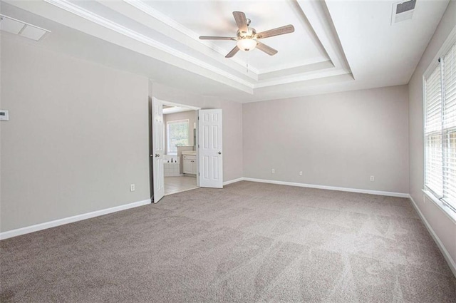4609 Mctyre Way, Marietta, GA 30064 - unfurnished room with a tray ceiling, ceiling fan, carpet flooring, and a healthy amount of sunlight