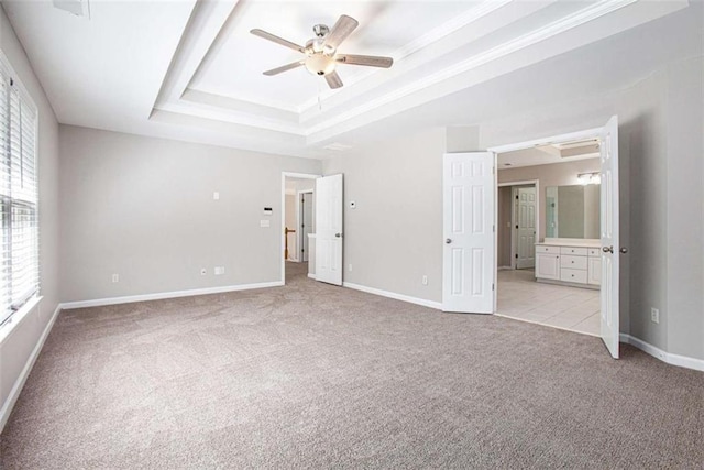 4609 Mctyre Way, Marietta, GA 30064 - unfurnished bedroom featuring a raised ceiling, light carpet, baseboards, and multiple windows
