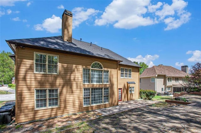4609 Mctyre Way, Marietta, GA 30064 - rear view of house with a patio area and a chimney