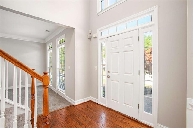 4609 Mctyre Way, Marietta, GA 30064 - entryway with crown molding, wood finished floors, stairs, and a wealth of natural light