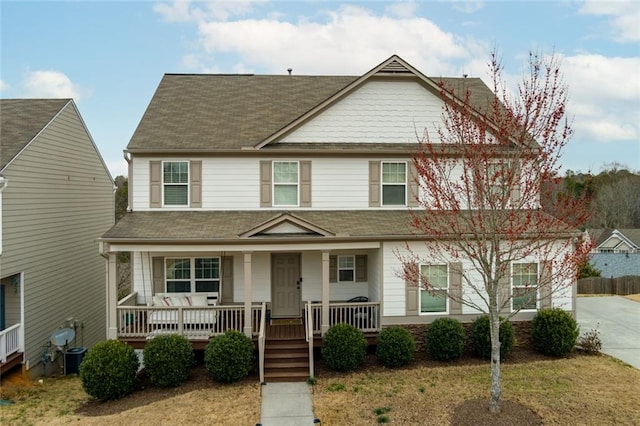 view of front of home with covered porch and driveway