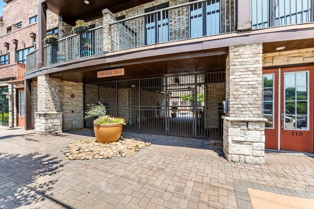 view of exterior entry with stone siding