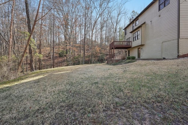 view of yard featuring a deck