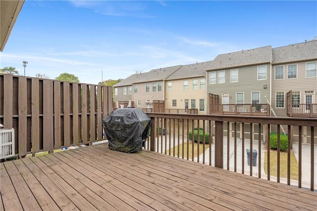 wooden deck with area for grilling