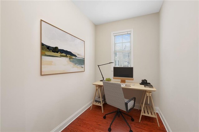 office with hardwood / wood-style flooring