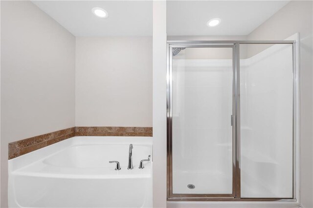 bathroom with plus walk in shower