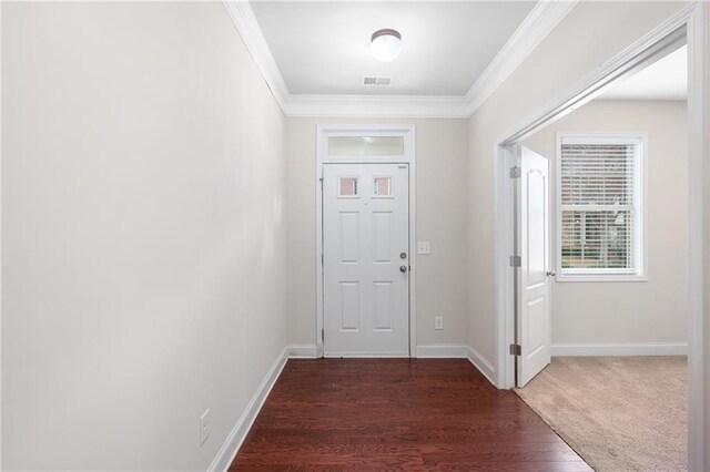 entryway with dark hardwood / wood-style floors and crown molding